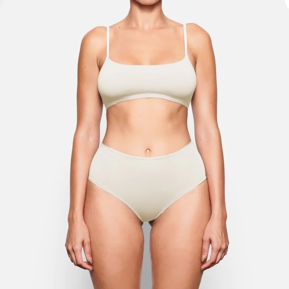 SKIMS/ NTW COTTON JERSEY FULL BRIEF PANTY in the color Bone.